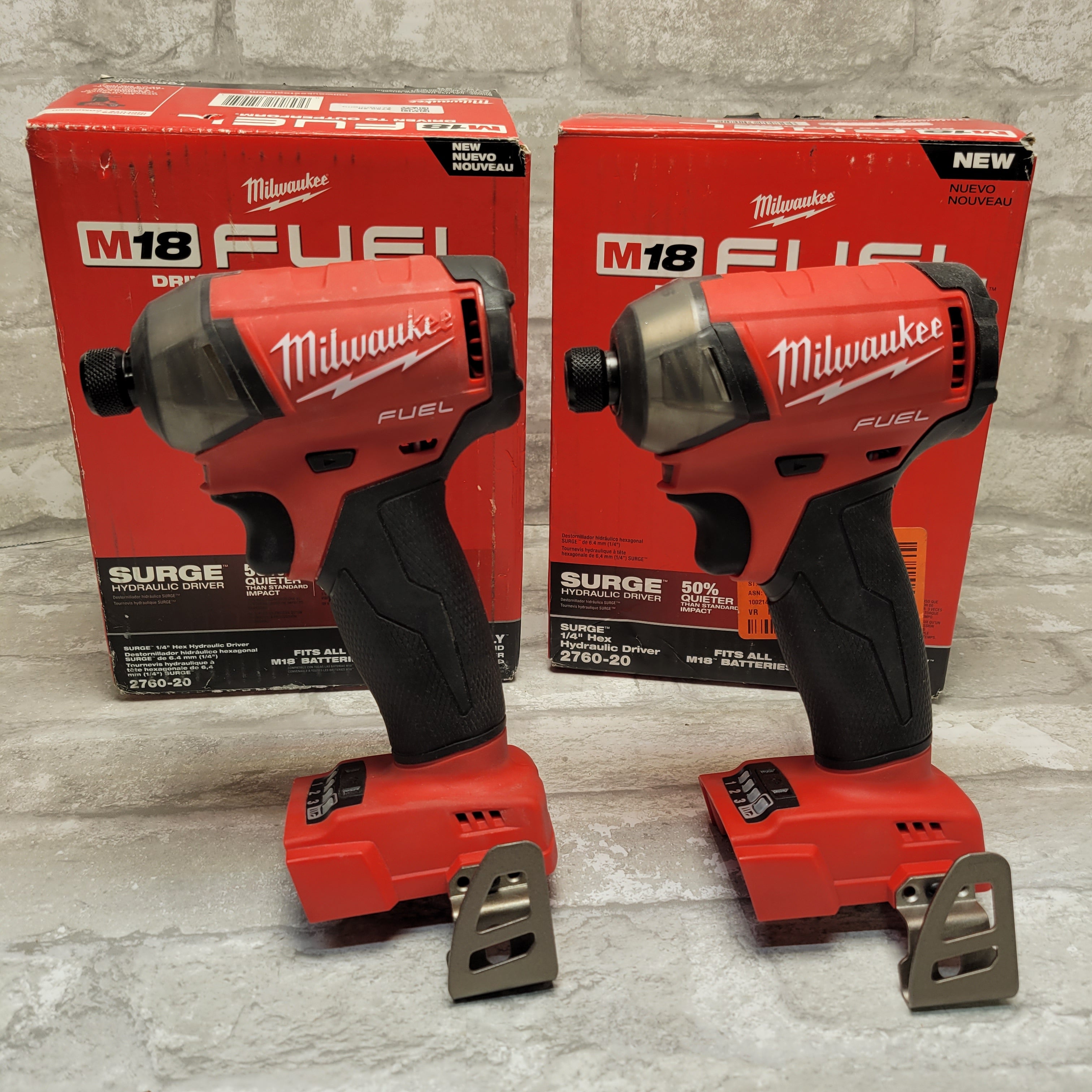 (2) Milwaukee M18 FUEL SURGE 18V Brushless 1/4" Hex Impact Driver *DAMAGED* (7944824357102)